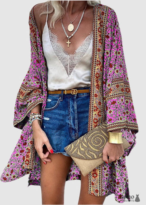 Cárdigan bohemio morado de punto de crochet calado con borlas estilo 2024