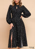 Vestido negro de manga larga con lunares