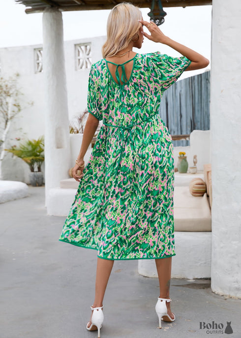 Vestido midi bohemio holgado con cuello redondo y espalda descubierta Ava