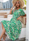 Vestido midi bohemio holgado con cuello redondo y espalda descubierta Ava