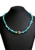 Collar bohemio con concha dorada de colores azules