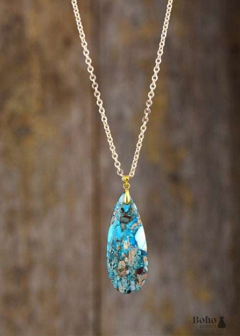 Collar bohemio con colgante de eclipse azul turquesa