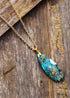 Collar bohemio con colgante de eclipse azul turquesa