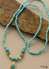 Collar bohemio con cuentas de piedra mala en turquesa y oro.