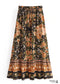 Faldas bohemias con estampado Maryam de flores negras y doradas para mujer