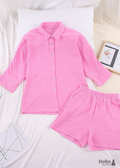 Conjunto de pijama bohemio Lucy Cotton en rosa y morado.