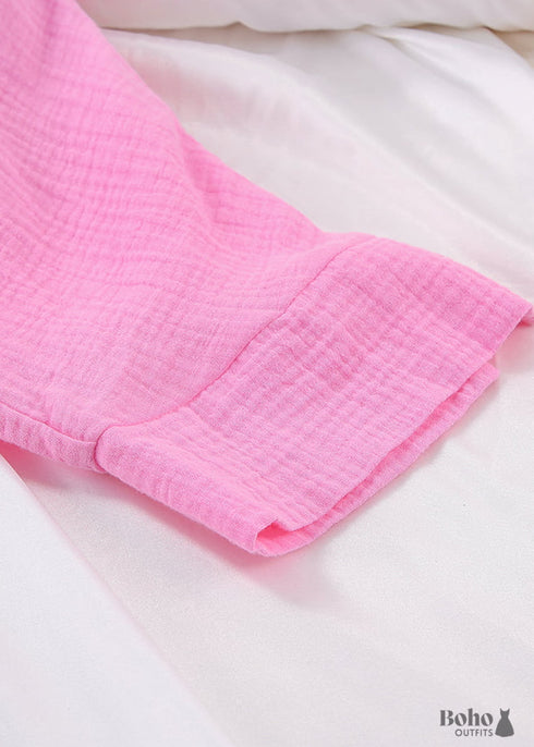 Conjunto de pijama bohemio Lucy Cotton en rosa y morado.