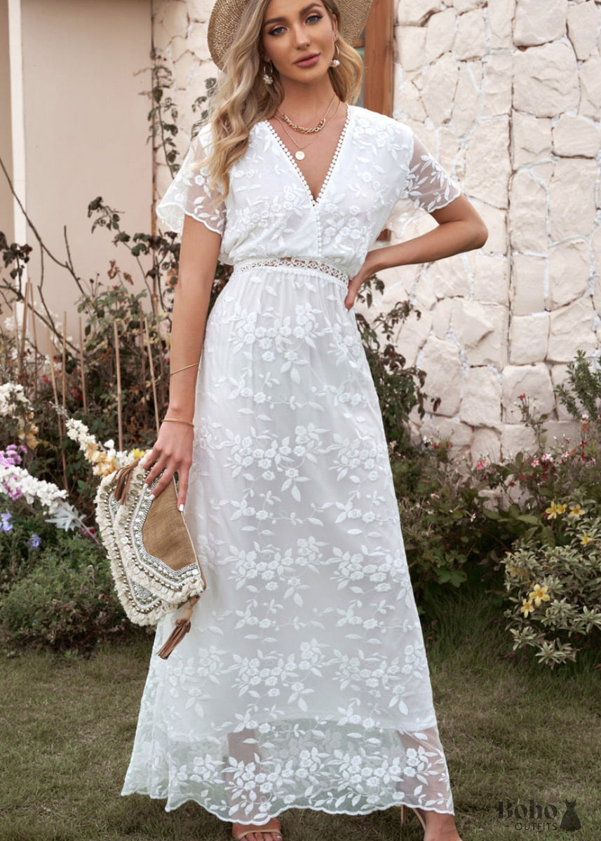 White lace dress shops with flowers