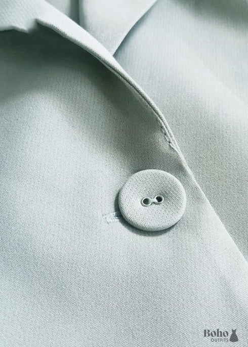 Blazer elegante con bolsillos de cuentas