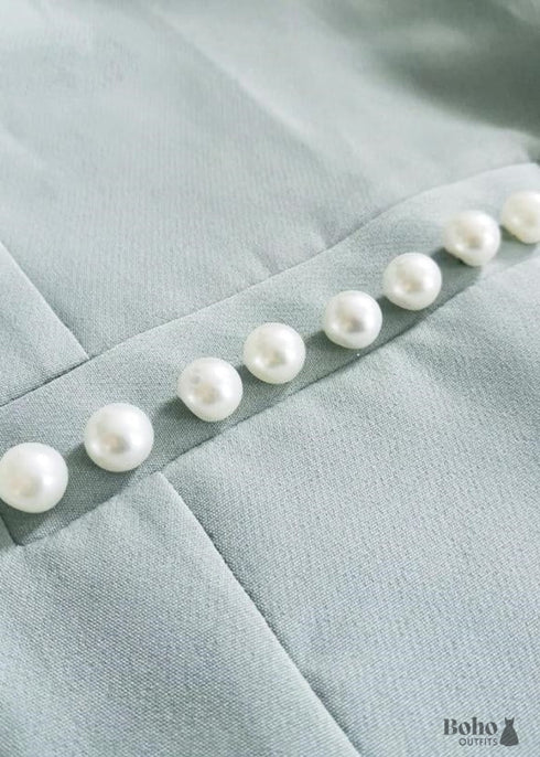 Blazer elegante con bolsillos de cuentas