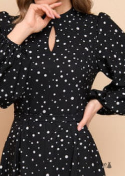 Vestido negro de manga larga con lunares
