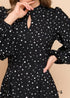 Vestido negro de manga larga con lunares