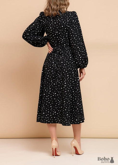 Vestido negro de manga larga con lunares
