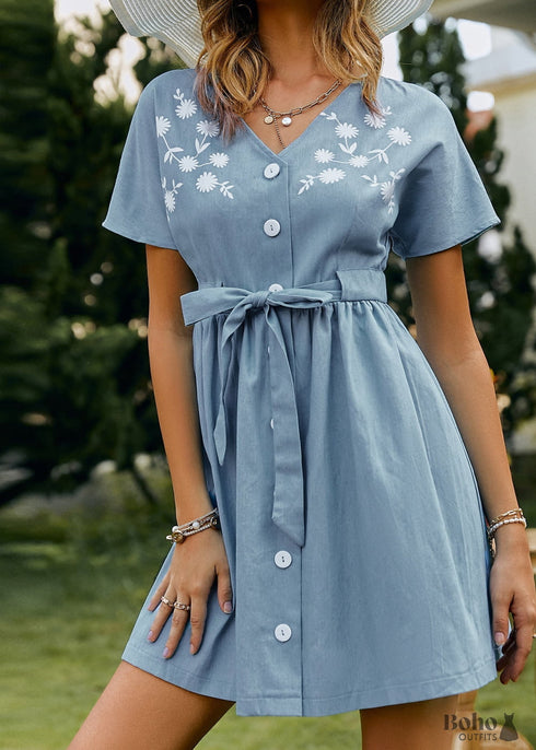 Minivestido azul con estampado floral navideño