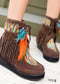 Botas indias bohemias con plumas y flecos