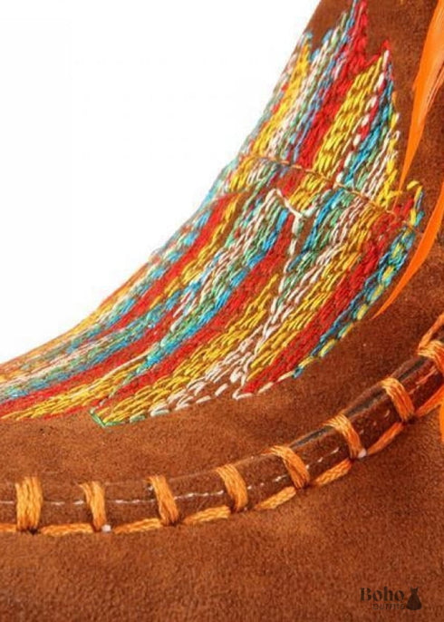 Botas indias bohemias con plumas y flecos